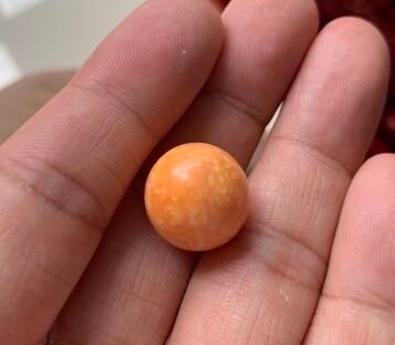Exquisite 29.9 Carat Deep Orange Round Melo Melo Pearl