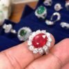 Oval Cut Faceted Ruby Ring With Diamonds