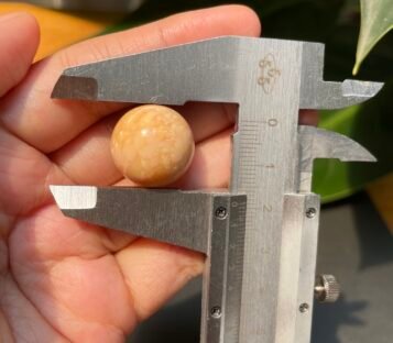 Remarkable 48.55 Carat Big Orange Round Melo Melo Pearl with Unique Structure 3 48 carat melo melo Pearl 2