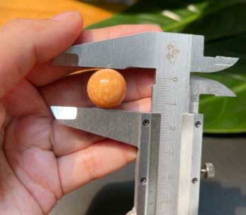 Extremely Rare 30.1 Carat Deep Orange Round Melo Pearl 5 IMG 1939 scaled