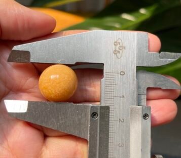 Extraordinary 30.00 Carat Deep Orange Round Melo Pearl 4 IMG 1945 scaled