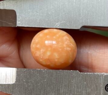 Enchanting 14.30 Carat Deep Orange Oval Melo Pearl