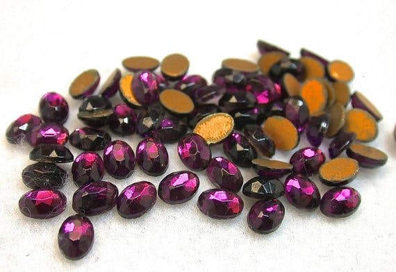 Glass gemstones in jewelry throughout history Glass gemstones in jewelry throughout history